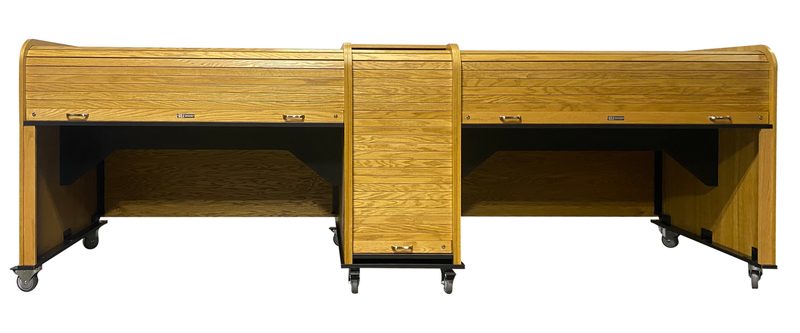 Custom Series 25007 three-section rolltop console desk in light oak, front view with two 61.5 inch rolltop desks flanking a 21 inch center bay, all tambours closed
