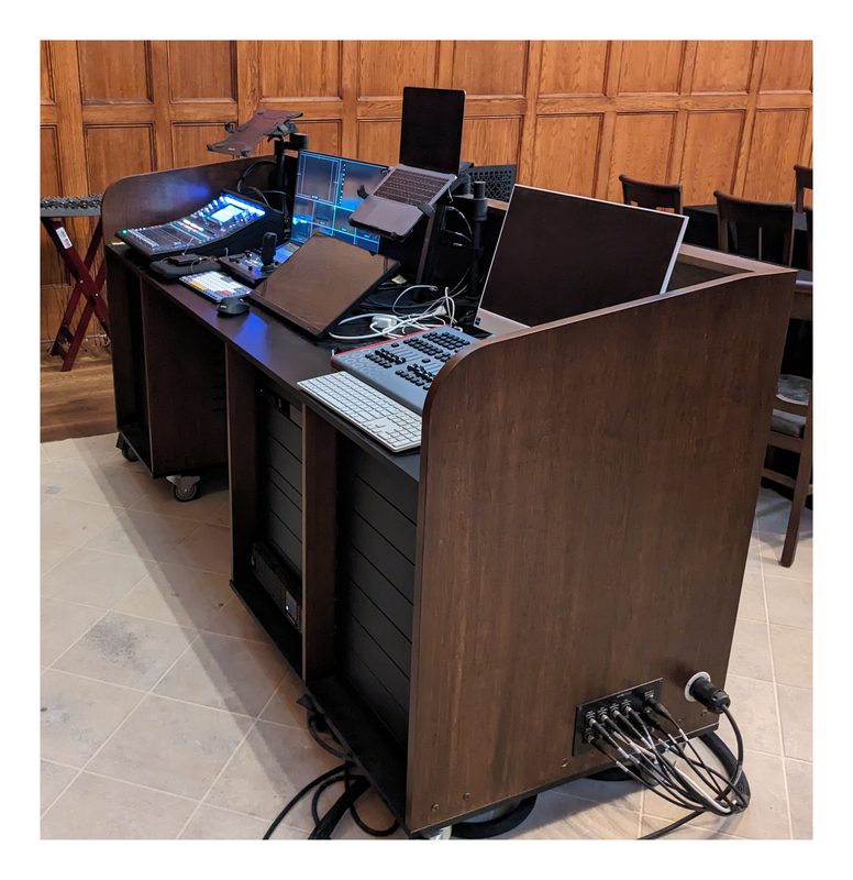 Open Series 22070 mobile production desk installed, locking casters in view